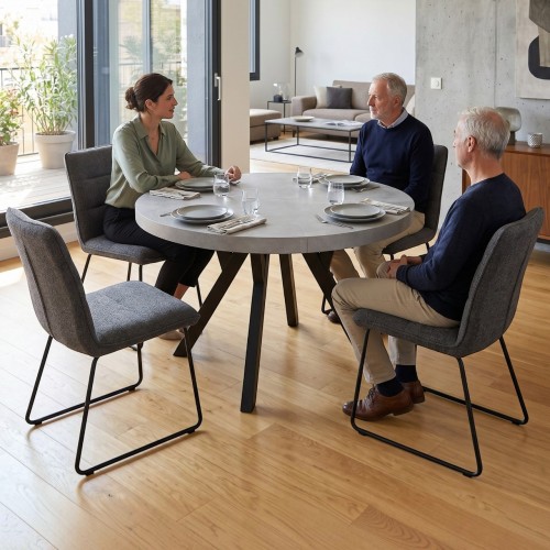 Aranżacja jadalni ze stołem okrągłym CONVIVIO beton atelier i czarnymi nogami